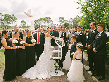Sarah & Greg married by Marry me Marilyn at the beautiful Sanctuary Cove Chapel Hyatt Regency released Doves 